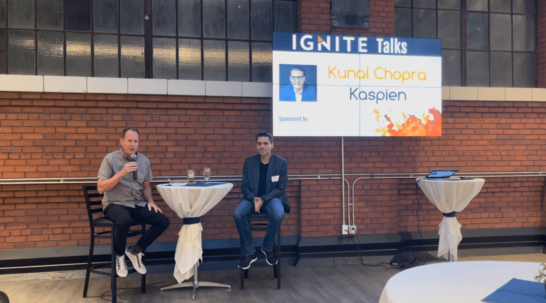 Kunal Chopra speaking at Ignite Talks on stage